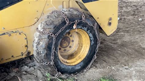 putting chains on a skid steer|chains for tracked skid steer.